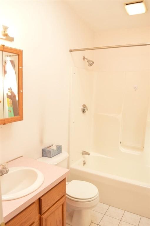 bathroom with toilet, shower / bathtub combination, tile patterned flooring, and vanity