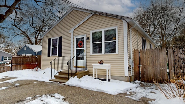 view of front of house with fence