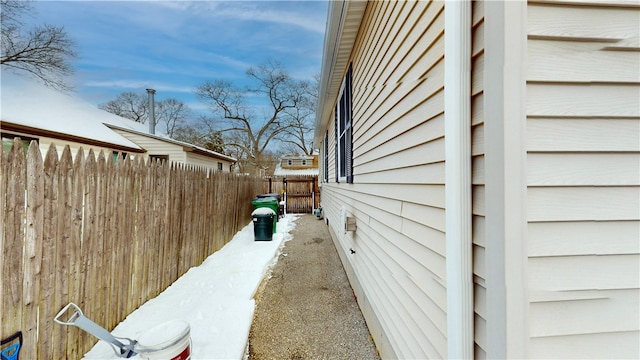 view of side of property with fence