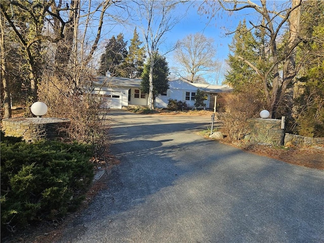 view of road featuring aphalt driveway