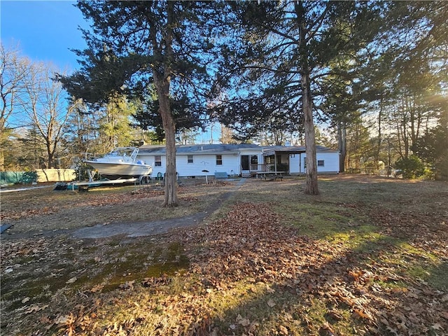 back of property featuring crawl space