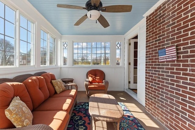 sunroom / solarium with ceiling fan