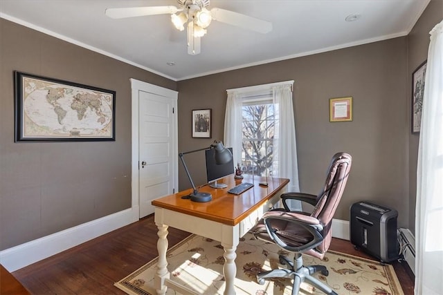 office with ceiling fan, a baseboard radiator, wood finished floors, baseboards, and ornamental molding