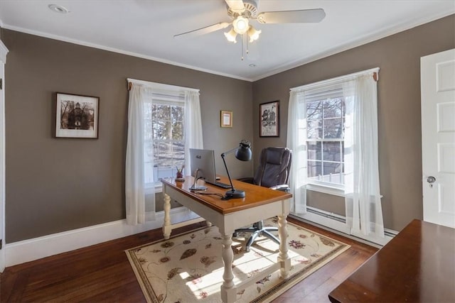 office area featuring baseboards, wood finished floors, a ceiling fan, and a healthy amount of sunlight