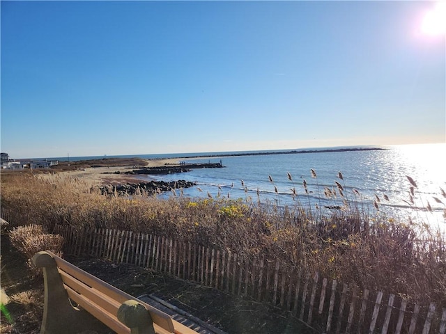 property view of water with fence