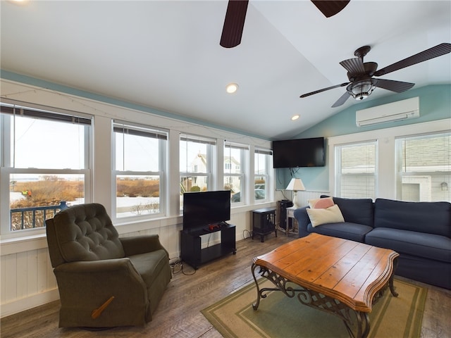 living area with lofted ceiling, ceiling fan, recessed lighting, wood finished floors, and a wall mounted AC