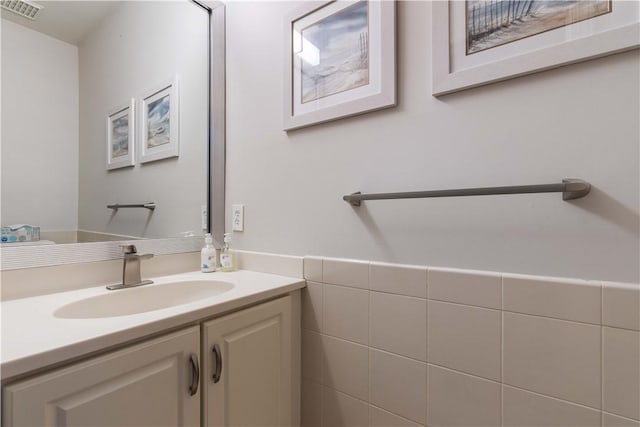 bathroom featuring visible vents and vanity