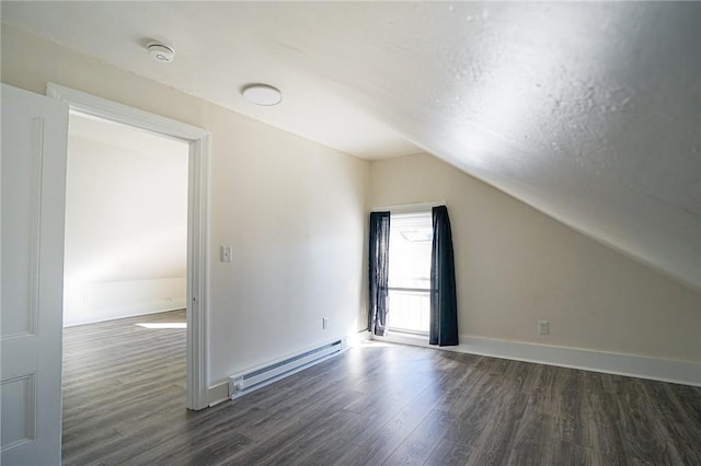 bonus room featuring lofted ceiling, a baseboard radiator, wood finished floors, and baseboards