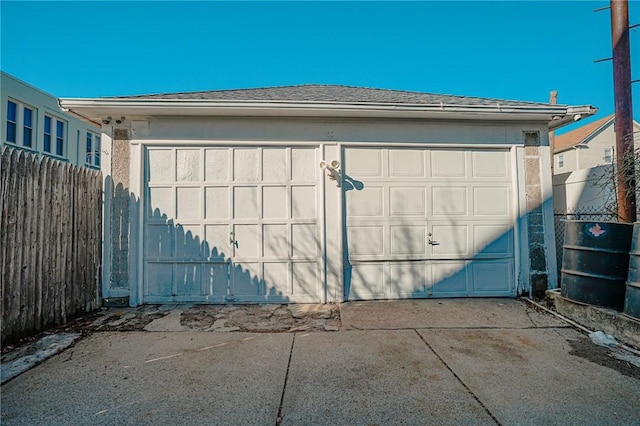 detached garage with fence