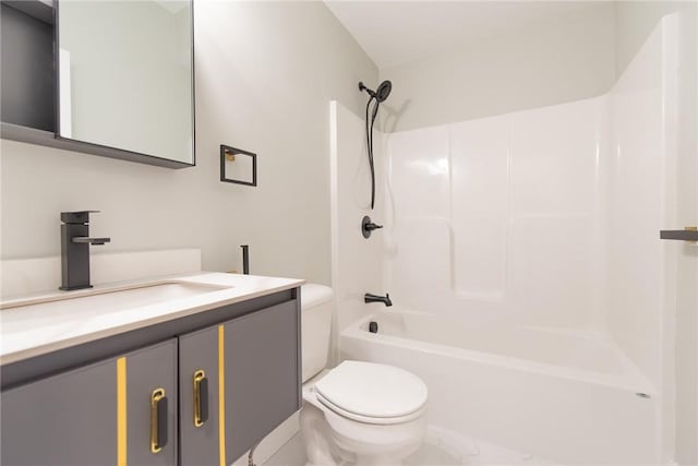 full bathroom featuring  shower combination, vanity, and toilet