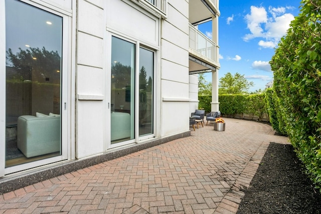 view of patio / terrace featuring fence