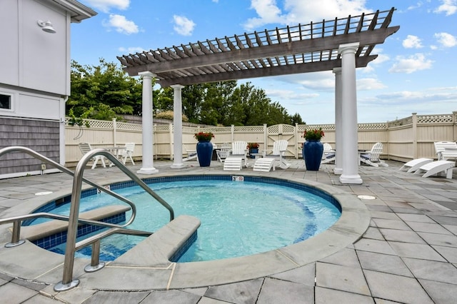 view of swimming pool with a community hot tub, a patio area, a fenced backyard, and a pergola