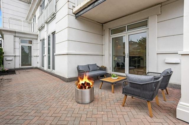 view of patio with french doors and an outdoor hangout area