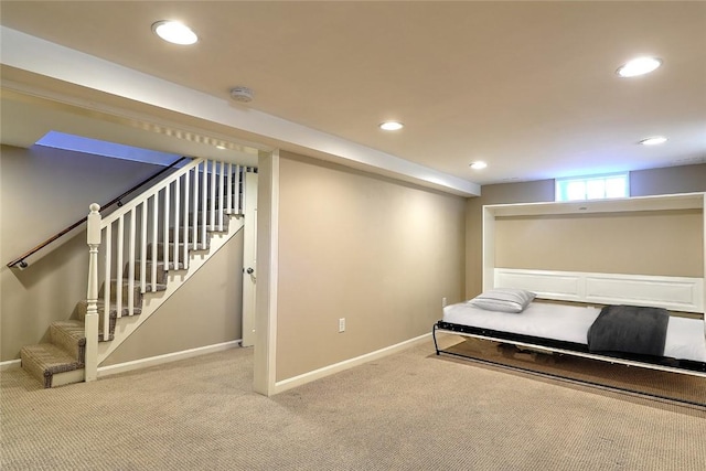 unfurnished bedroom featuring recessed lighting, carpet flooring, and baseboards