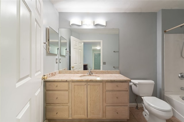 full bathroom featuring toilet, tile patterned flooring, vanity, and shower / bathing tub combination