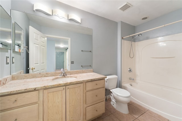 bathroom featuring visible vents, toilet, tile patterned floors, tub / shower combination, and vanity