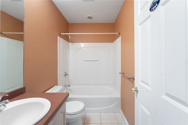 full bath with shower / washtub combination, toilet, a textured ceiling, vanity, and tile patterned floors