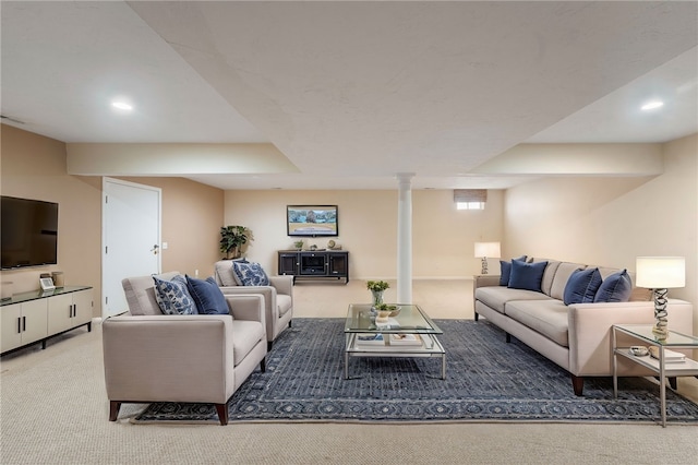 carpeted living area with recessed lighting