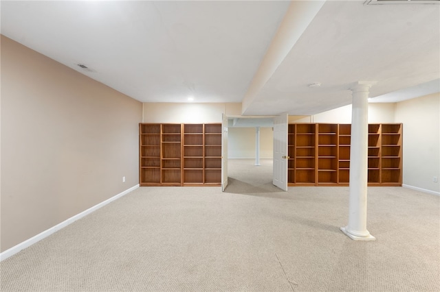 finished below grade area with carpet floors, visible vents, and baseboards