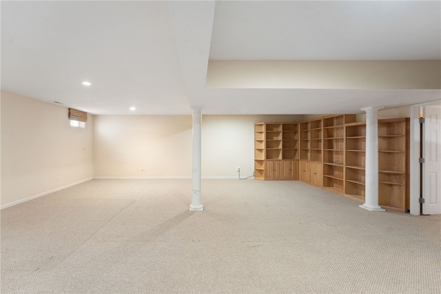 basement featuring carpet, baseboards, and recessed lighting