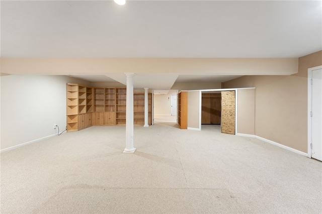 finished below grade area featuring carpet floors and baseboards