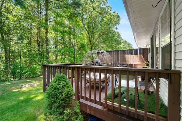 deck featuring a lawn