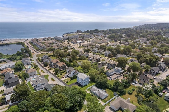 birds eye view of property featuring a residential view and a water view