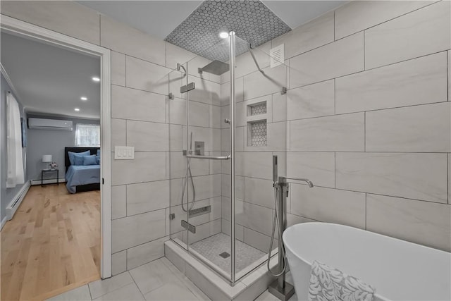 full bathroom with a stall shower, a soaking tub, ensuite bath, an AC wall unit, and tile walls