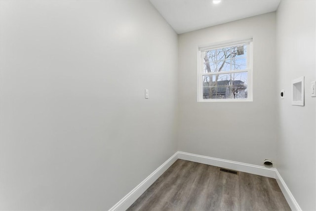 laundry area with baseboards, laundry area, visible vents, and hookup for an electric dryer