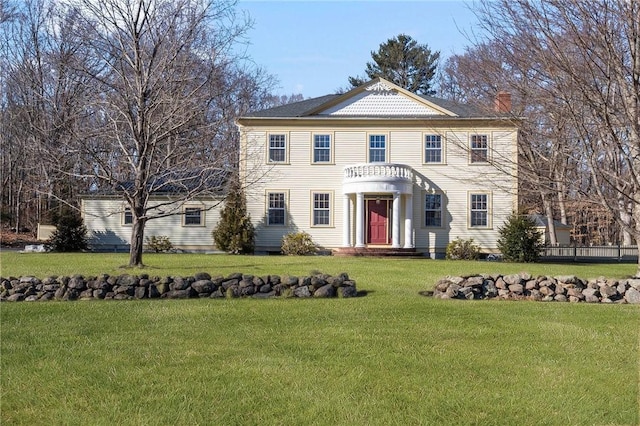 view of front of property with a front lawn