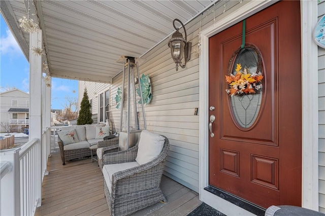 doorway to property with a porch