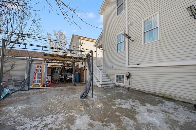 view of home's exterior with stairs