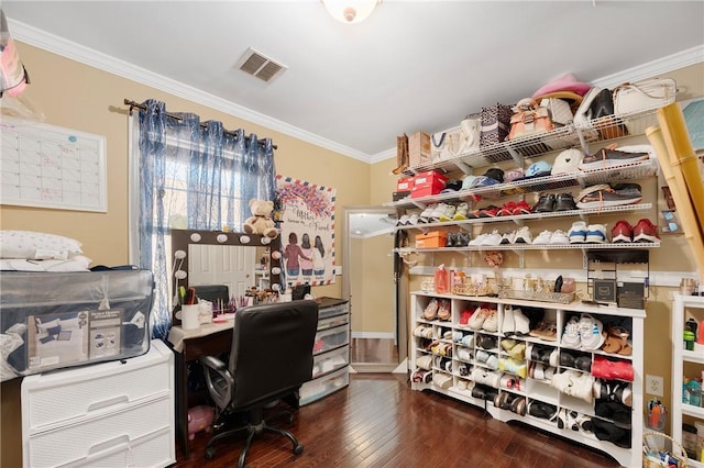 office area featuring wood-type flooring, visible vents, and crown molding