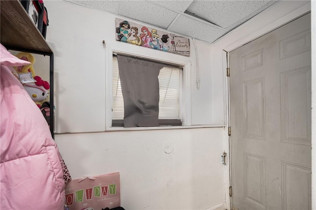 bedroom featuring a drop ceiling