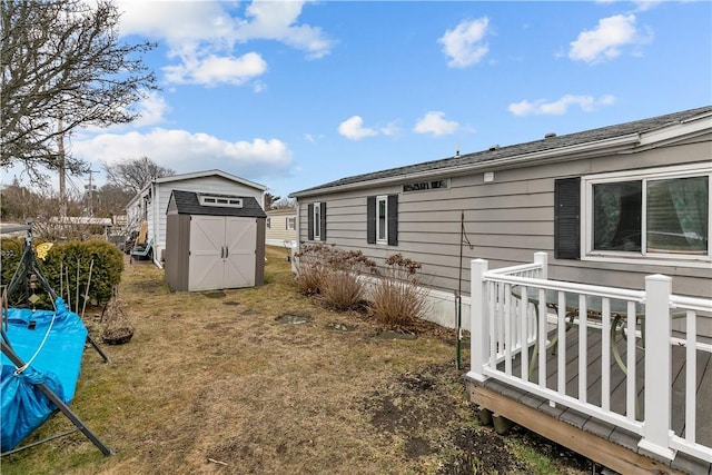 exterior space with a shed and an outbuilding