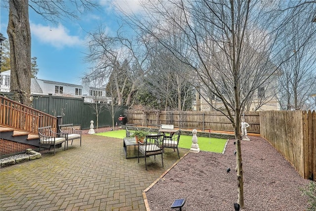 view of patio featuring a fenced backyard