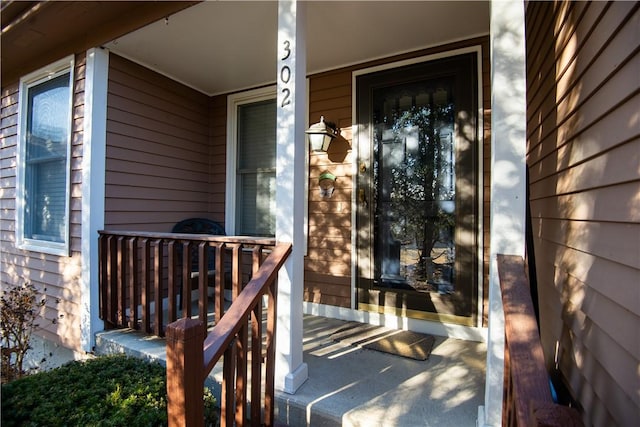 entrance to property with a porch