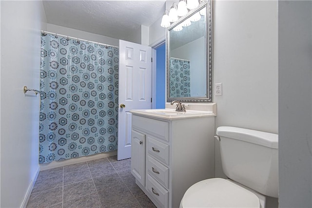 bathroom featuring toilet, tile patterned floors, a shower with curtain, and vanity