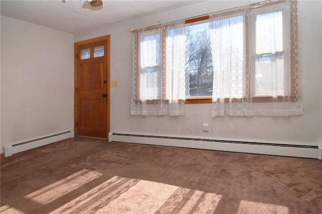 entryway featuring carpet flooring, a ceiling fan, and a baseboard radiator