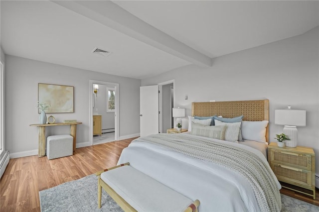 bedroom with visible vents, a baseboard heating unit, baseboards, beam ceiling, and wood finished floors