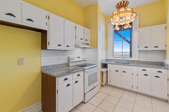 kitchen with under cabinet range hood, electric range, white cabinets, and a sink