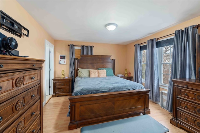 bedroom with light wood-type flooring