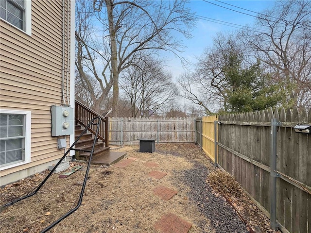 view of yard with a fenced backyard