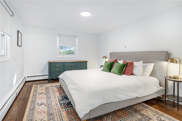 bedroom featuring a baseboard radiator and dark wood-type flooring