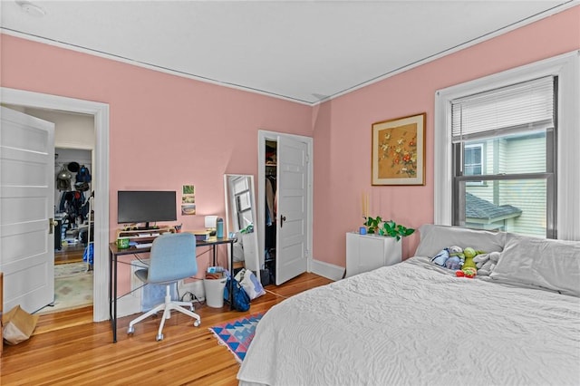 bedroom with light wood-style flooring