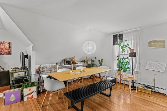 dining space with light wood-type flooring