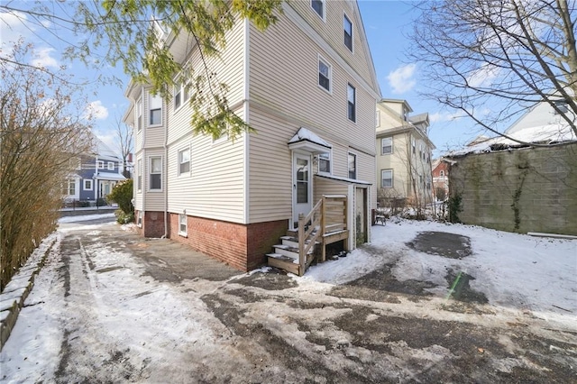 view of snow covered property