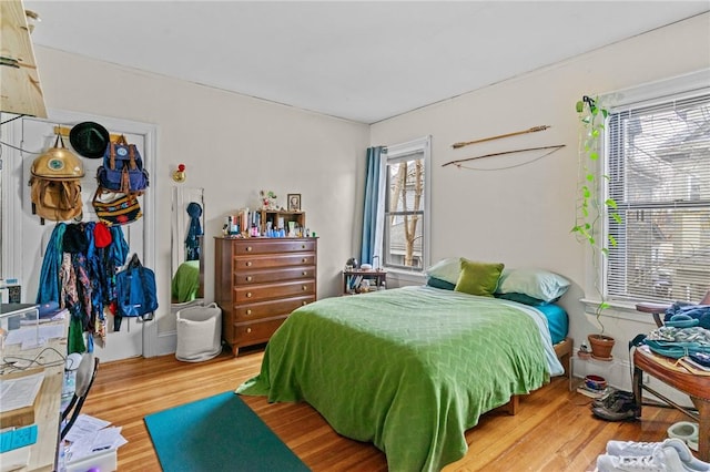 bedroom featuring wood finished floors