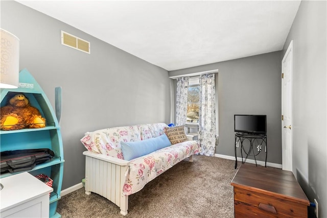 interior space featuring carpet floors, visible vents, and baseboards