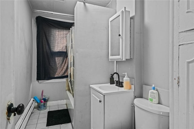 full bathroom with a baseboard heating unit, tile patterned flooring, vanity, and toilet